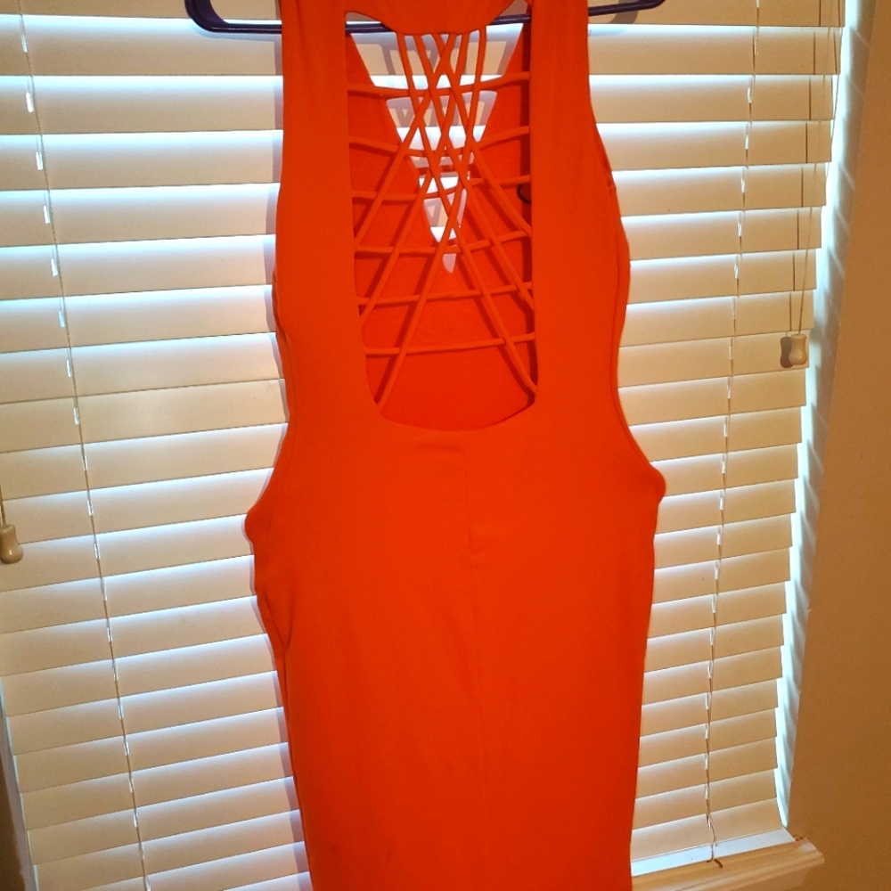 Bebe fitted Orange open backed dress